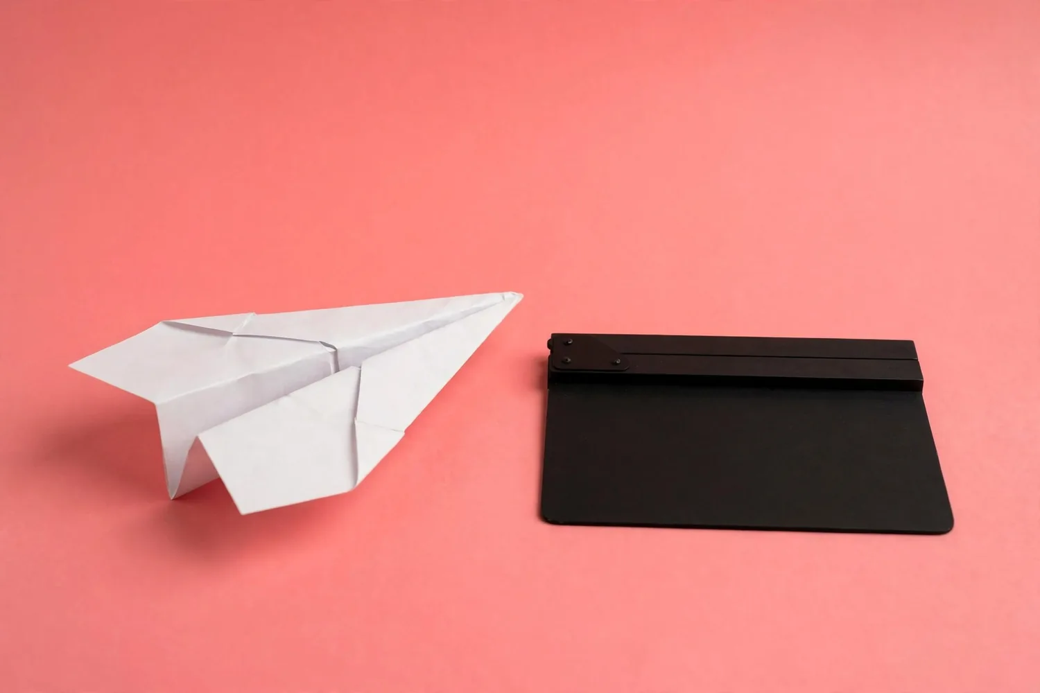 A paper plane and a clapperboard